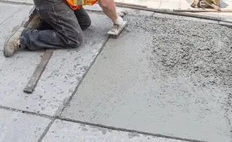 Professional repairing a concrete floor in Tampa, FL