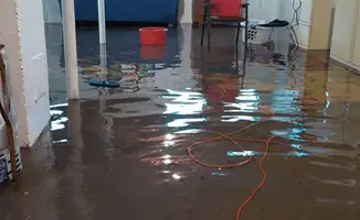 Basement with boiler, cabinets and washing machine completely flooded in Tampa, FL