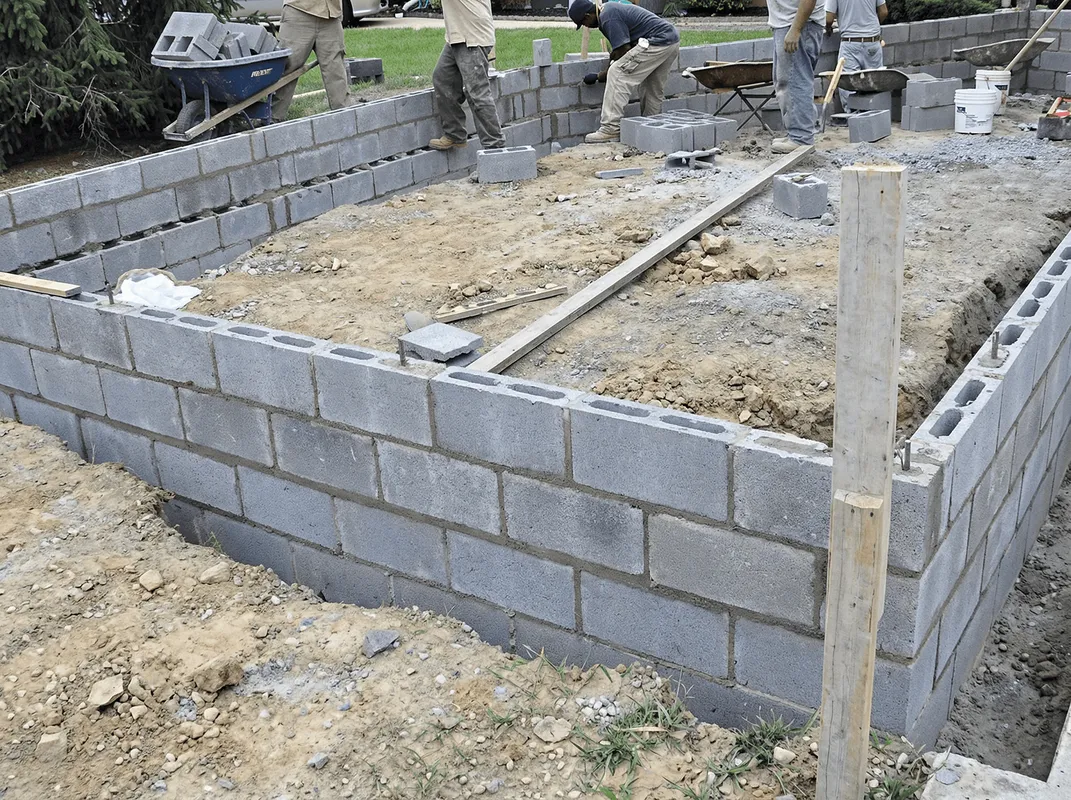 Professionals building a foundation with blocks in Tampa, FL